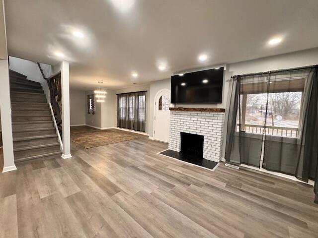 940 Idaho Street Gary, IN 46403 - Photo 3 of 32 a view of a livingroom with a fireplace wooden floor and window