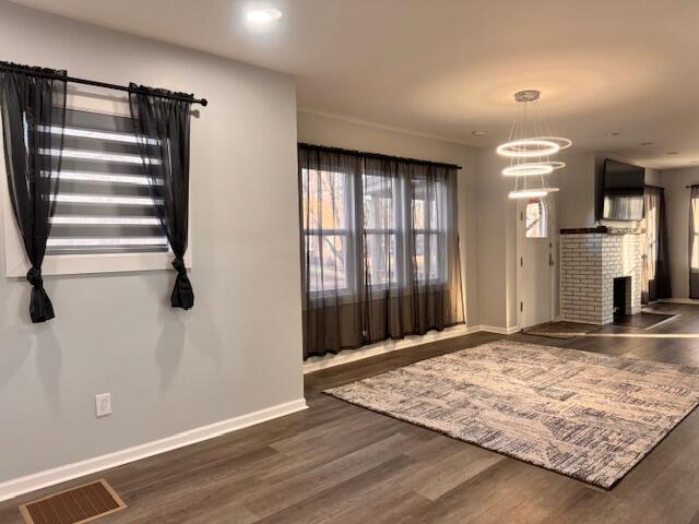 940 Idaho Street Gary, IN 46403 - Photo 4 of 32 an empty room with windows and entrance