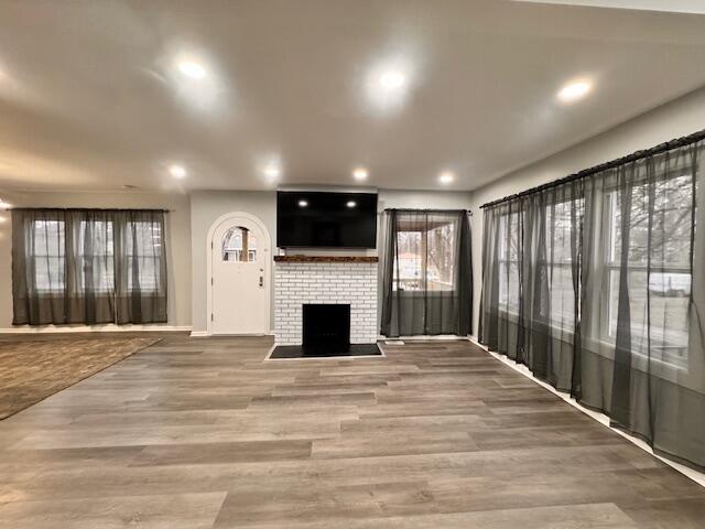 940 Idaho Street Gary, IN 46403 - Photo 7 of 32 a view of an empty room with a fireplace