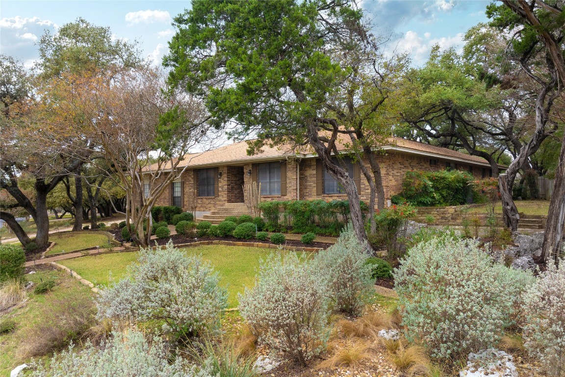 5314 Musket Ridge Austin, TX 78759 - Photo 1 of 1 a front view of a house with garden