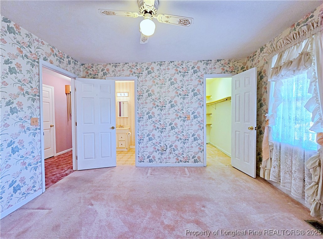 1459 Crawford Wright Road Raeford, NC 28376 - Photo 26 of 50 a view of an empty room with a bathroom