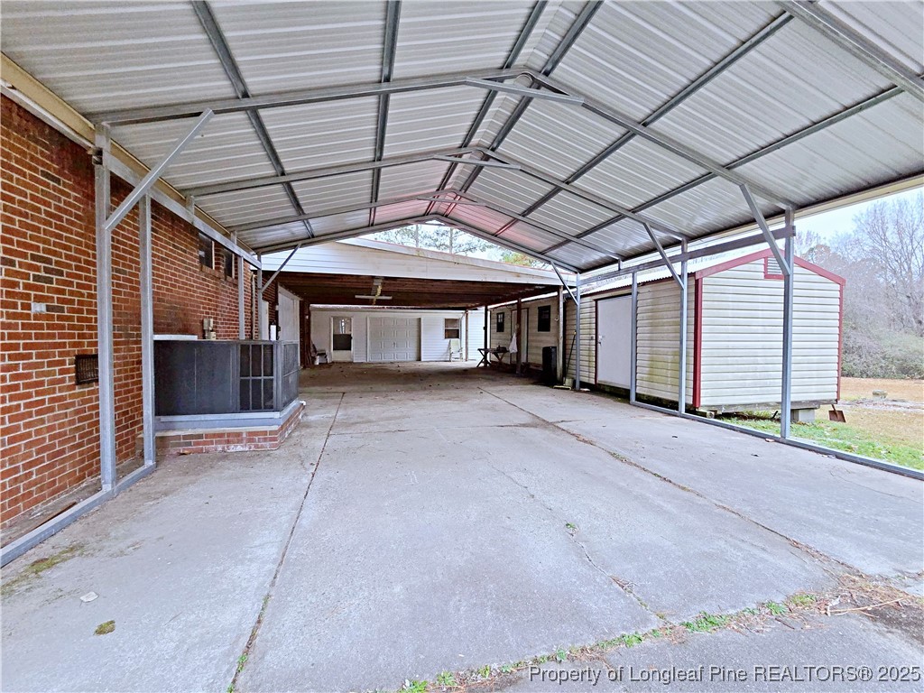 1459 Crawford Wright Road Raeford, NC 28376 - Photo 34 of 50 a view of empty room with wooden ceiling