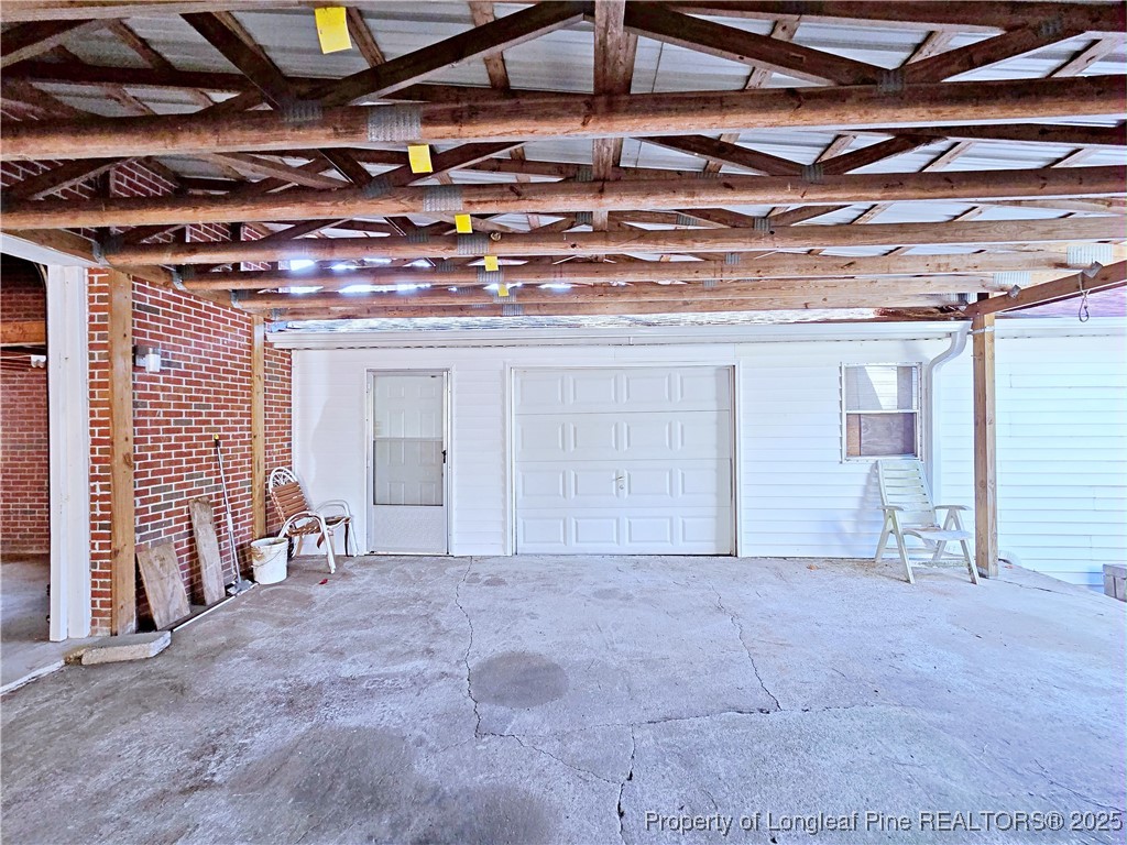 1459 Crawford Wright Road Raeford, NC 28376 - Photo 38 of 50 a view of a room with wooden walls