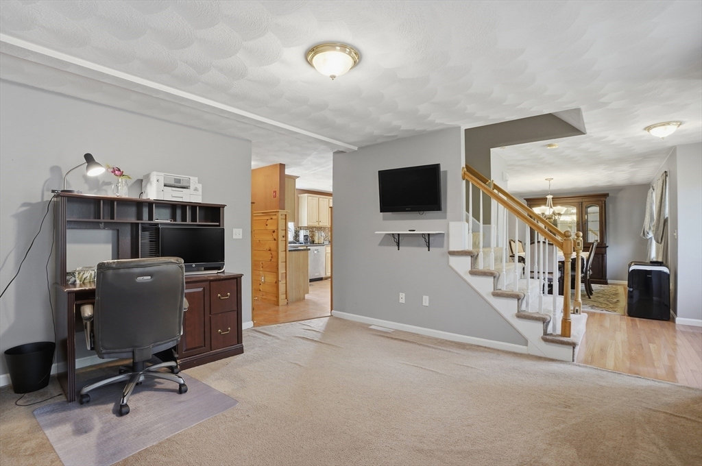 160 Gray Road Templeton, MA 01468 - Photo 8 of 42 a view of a livingroom with furniture and a flat screen tv