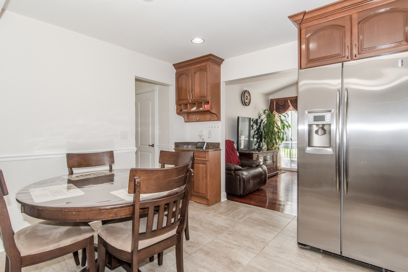 1144 Needham Road Naperville, IL 60563 - Photo 16 of 52 a view of a dining room with furniture