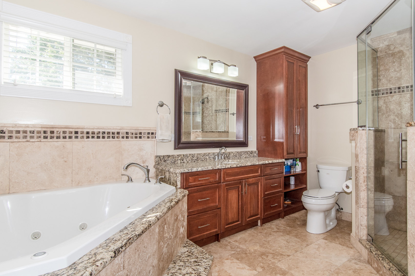 1144 Needham Road Naperville, IL 60563 - Photo 26 of 52 a bathroom with a granite countertop tub sink and mirror