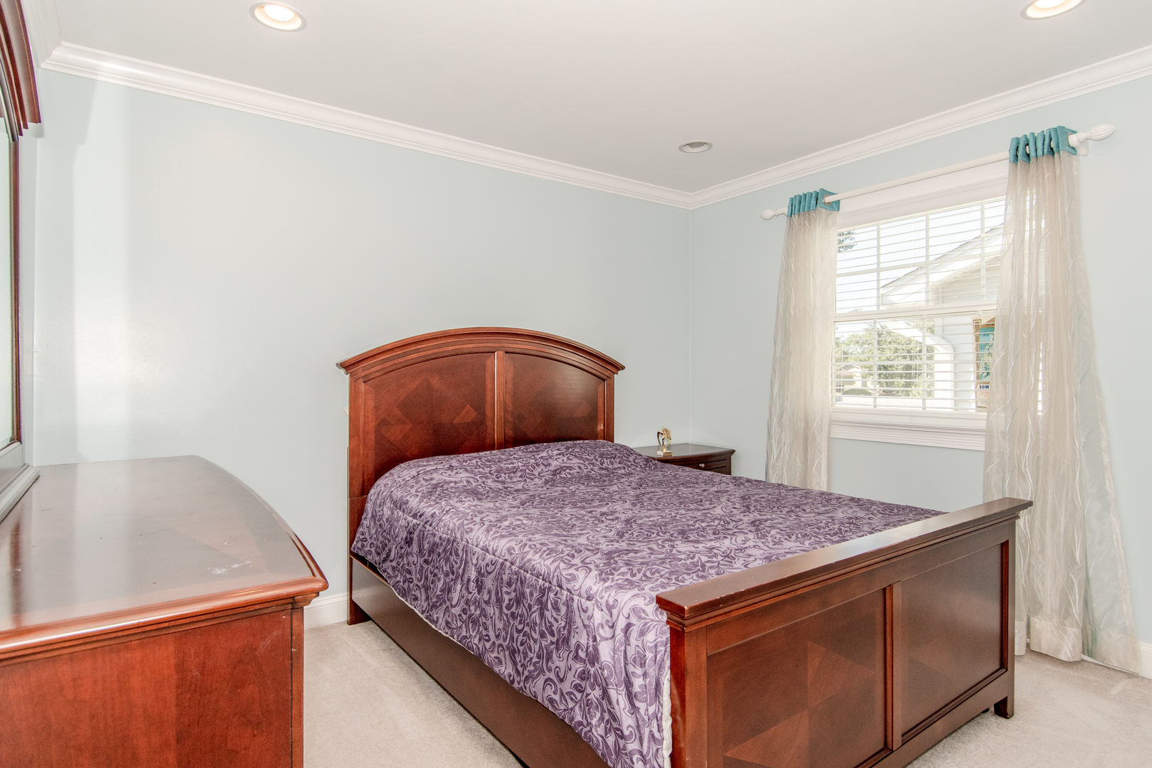 1144 Needham Road Naperville, IL 60563 - Photo 28 of 52 a bedroom with a bed and dresser