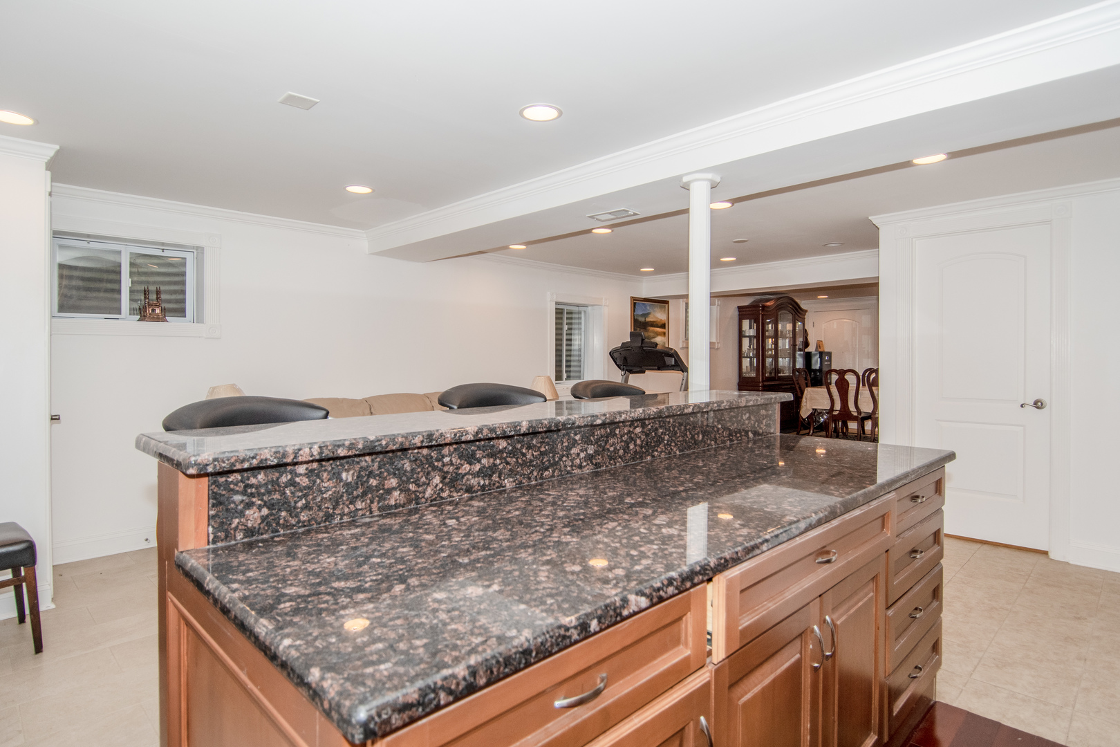1144 Needham Road Naperville, IL 60563 - Photo 36 of 52 a living room with granite countertop a sink and a wooden floor
