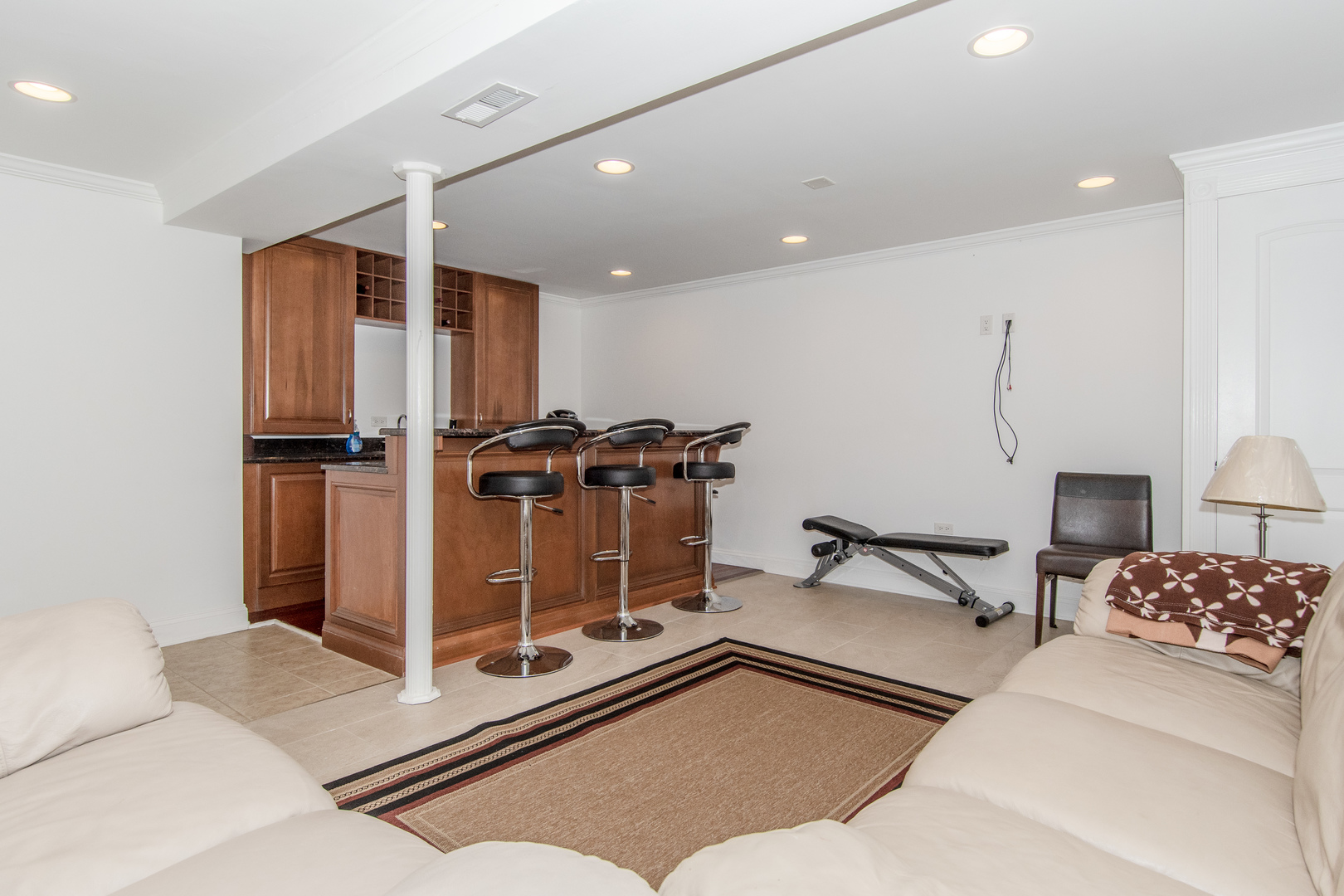 1144 Needham Road Naperville, IL 60563 - Photo 41 of 52 a room with gym equipment and wooden floor