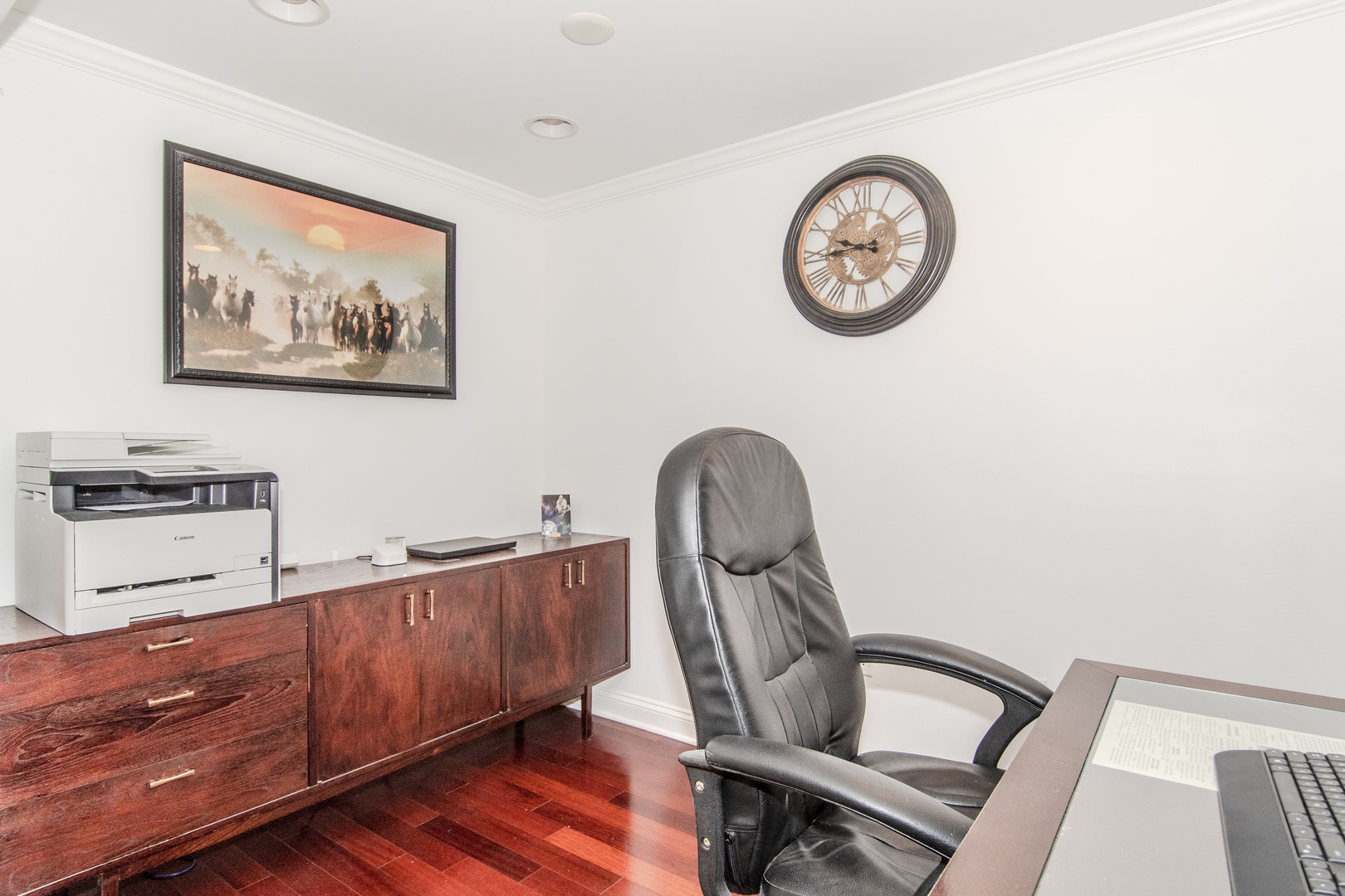 1144 Needham Road Naperville, IL 60563 - Photo 42 of 52 a view of a hallway with paintings on the wall
