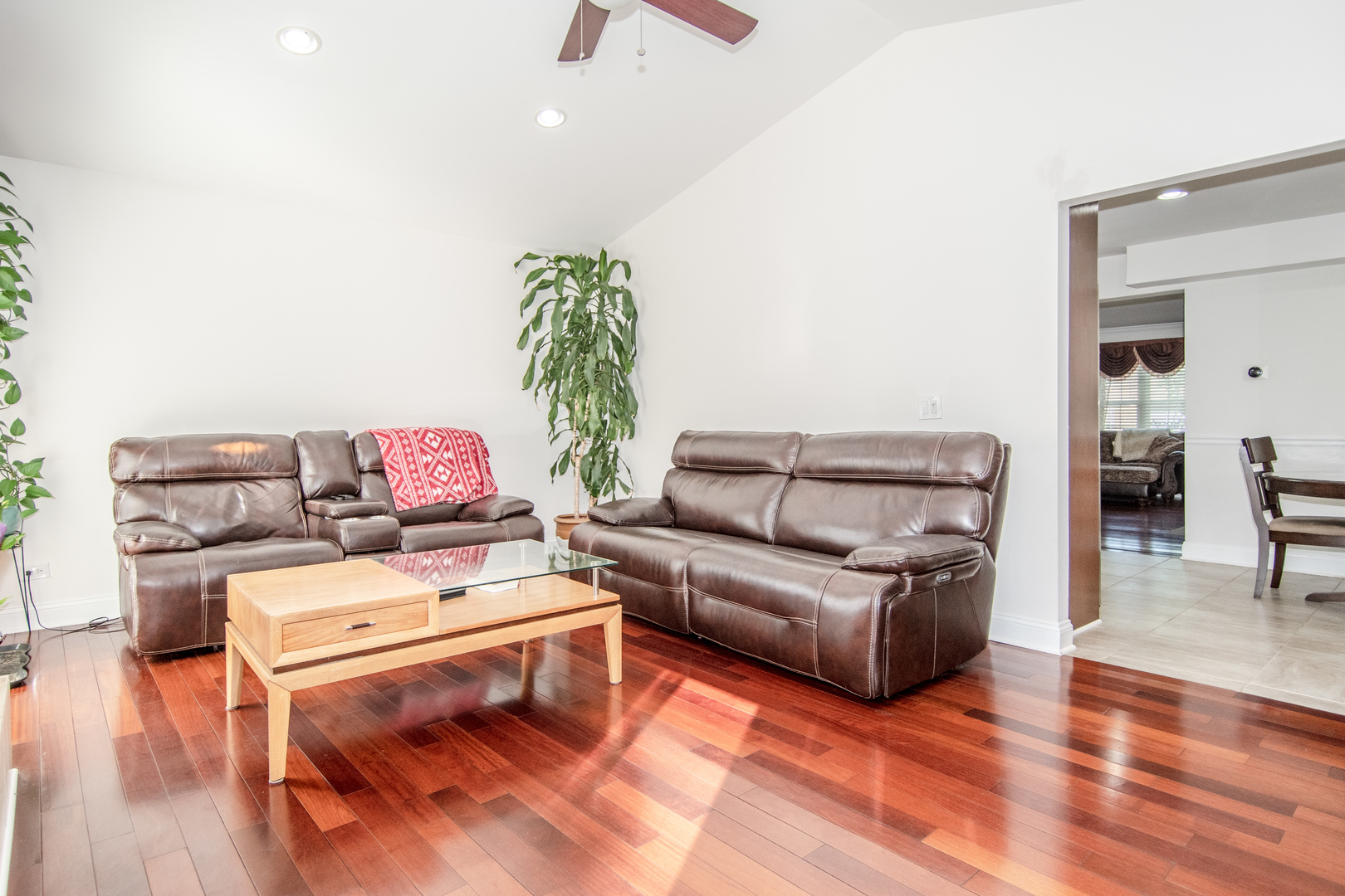 1144 Needham Road Naperville, IL 60563 - Photo 8 of 52 a living room with furniture and a wooden floor