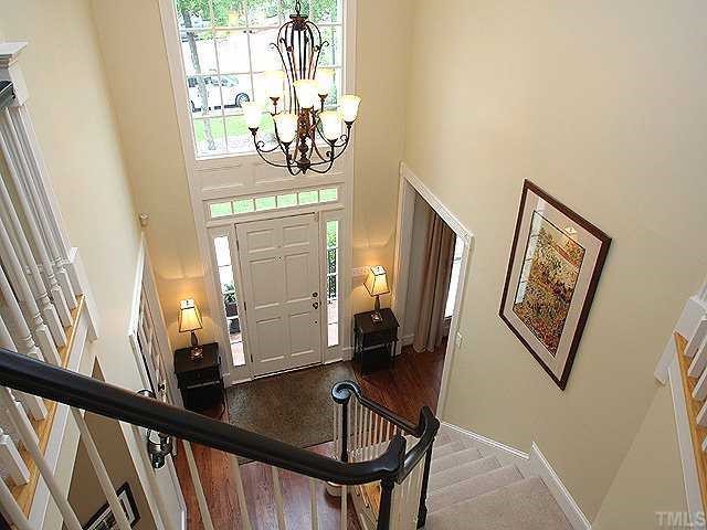 9121 Storrington Way Raleigh, NC 27615 - Photo 2 of 12 Entry with 2 story Foyer & large Palladium Window