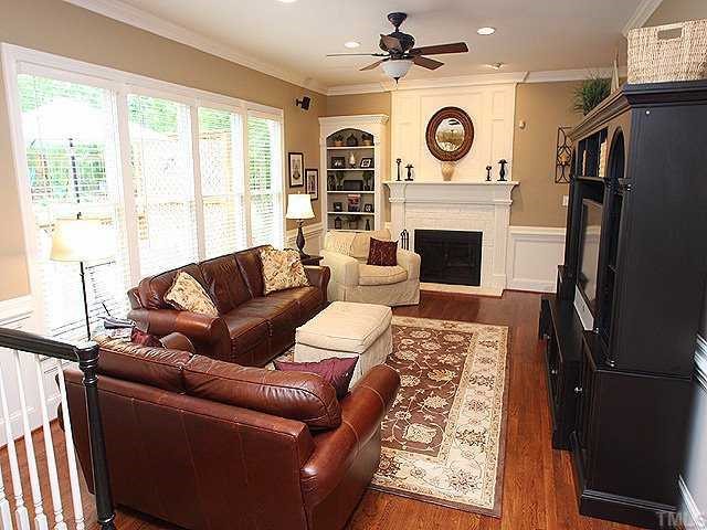 9121 Storrington Way Raleigh, NC 27615 - Photo 6 of 12 Family/Hearth Room Open to Kitchen & w/Stairs to 2nd Floor