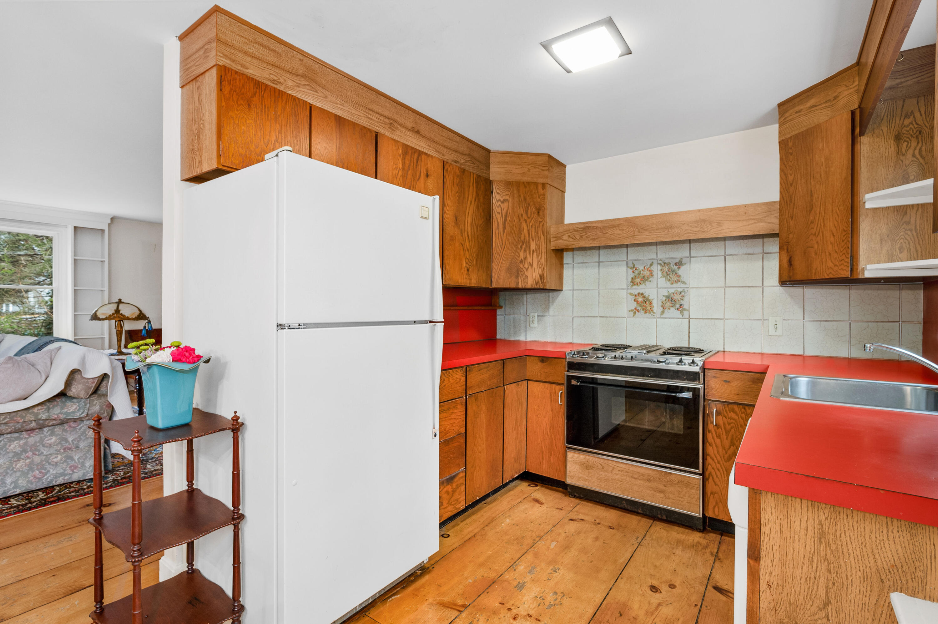538 South Orleans Road Orleans, MA 02653 - Photo 19 of 35 a kitchen with stainless steel appliances granite countertop a refrigerator and a stove top oven