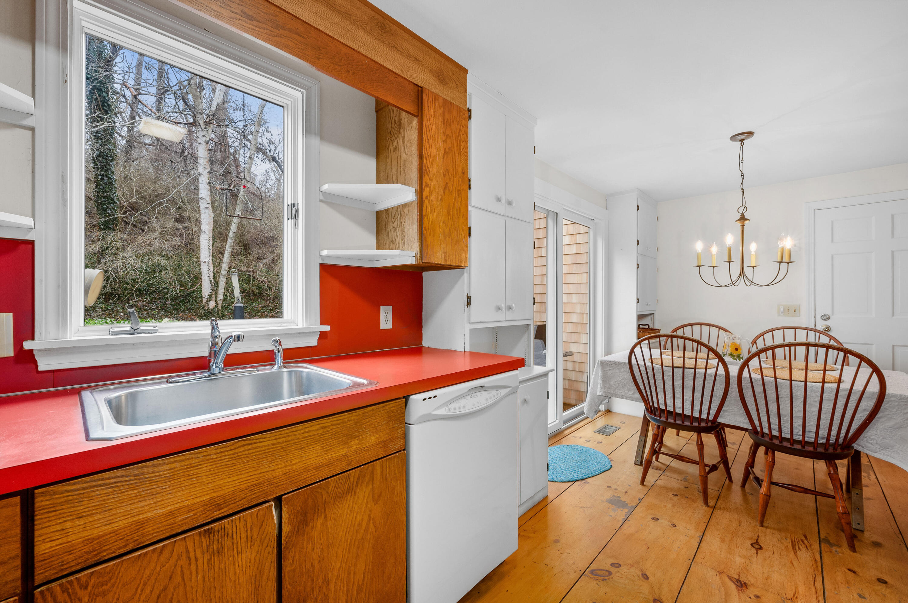 538 South Orleans Road Orleans, MA 02653 - Photo 20 of 35 a outdoor dining room with furniture a chandelier and wooden floor