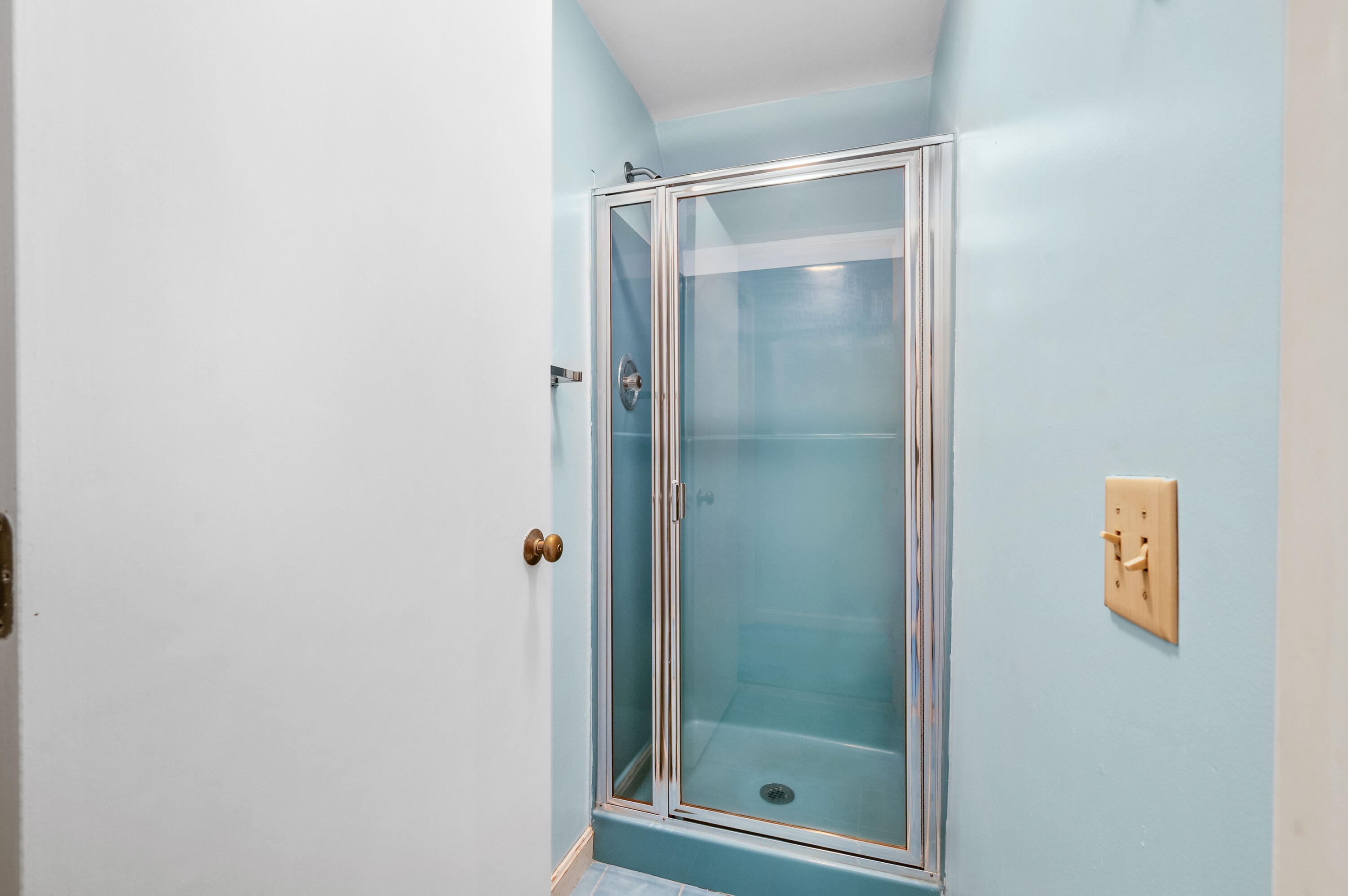 538 South Orleans Road Orleans, MA 02653 - Photo 29 of 35 a bathroom with a glass shower door