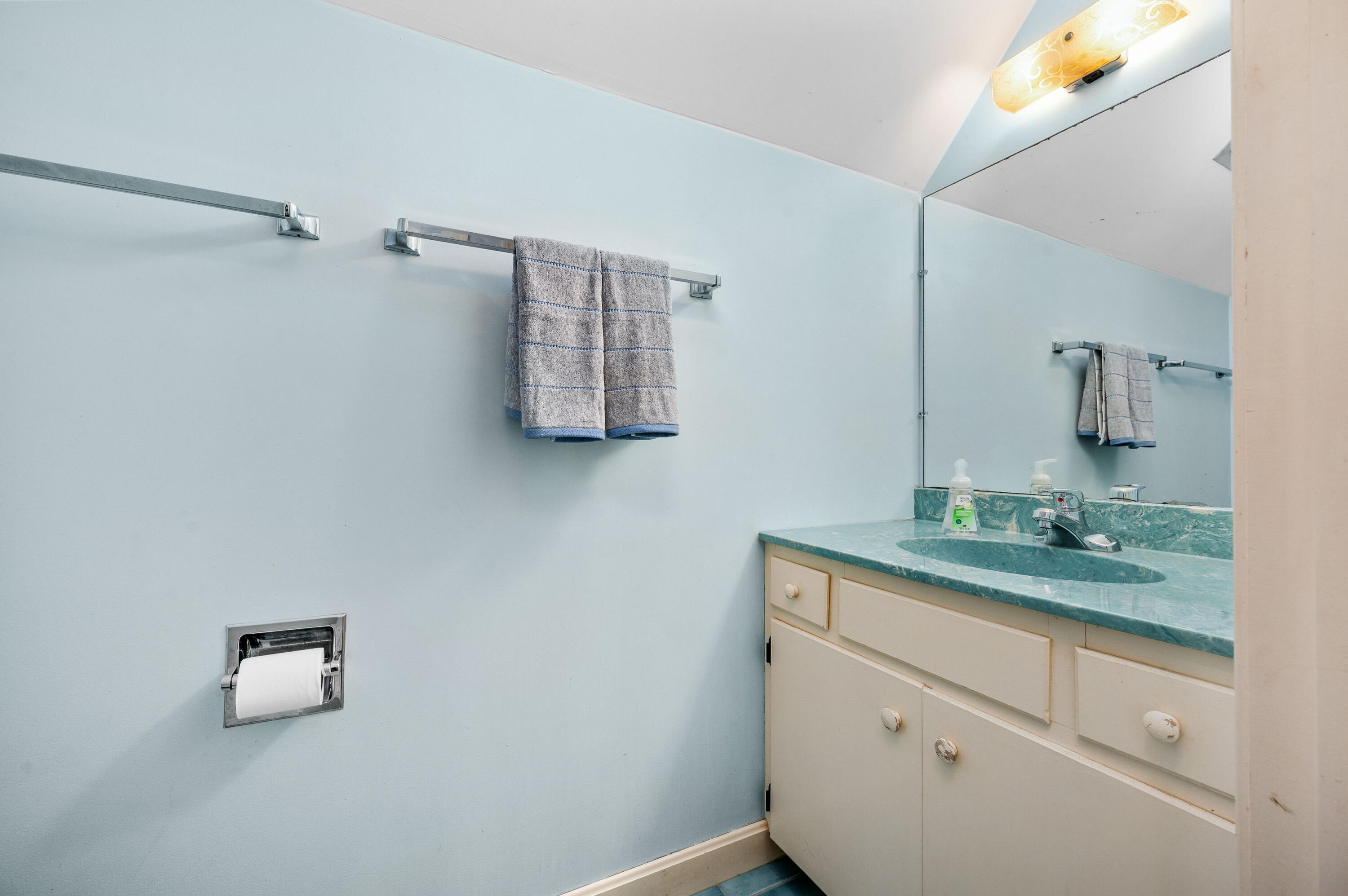 538 South Orleans Road Orleans, MA 02653 - Photo 30 of 35 a bathroom with a granite countertop sink and a mirror