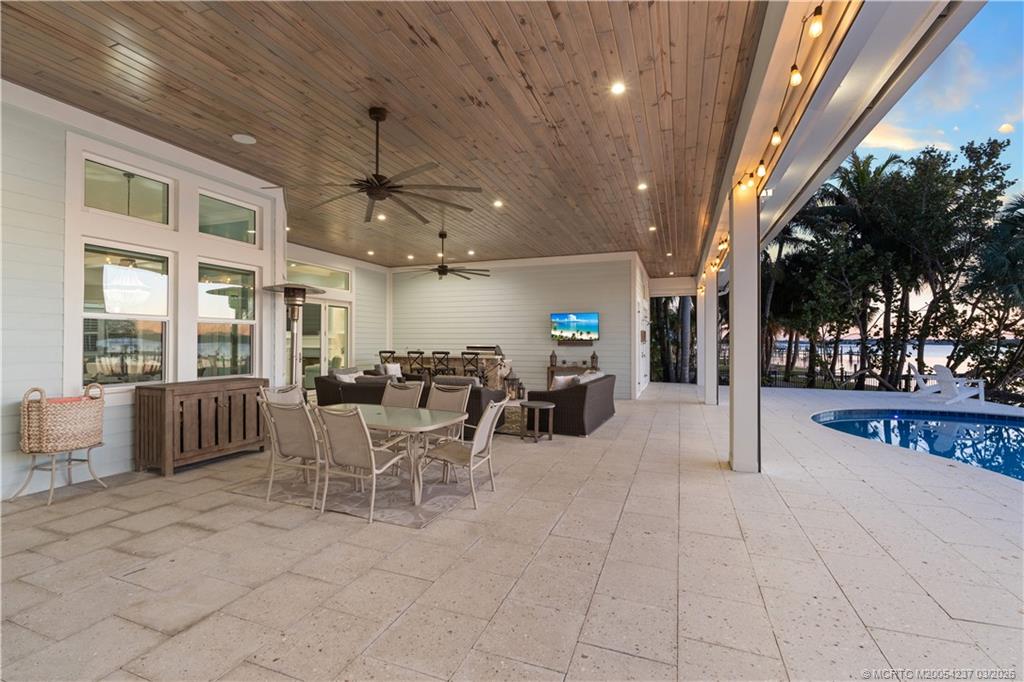 1912 Northwest Cove Circle Stuart, FL 34994 - Photo 13 of 24 a lobby with furniture and large windows