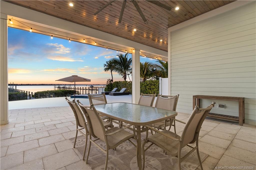 1912 Northwest Cove Circle Stuart, FL 34994 - Photo 14 of 24 a dining space with furniture and outdoor space