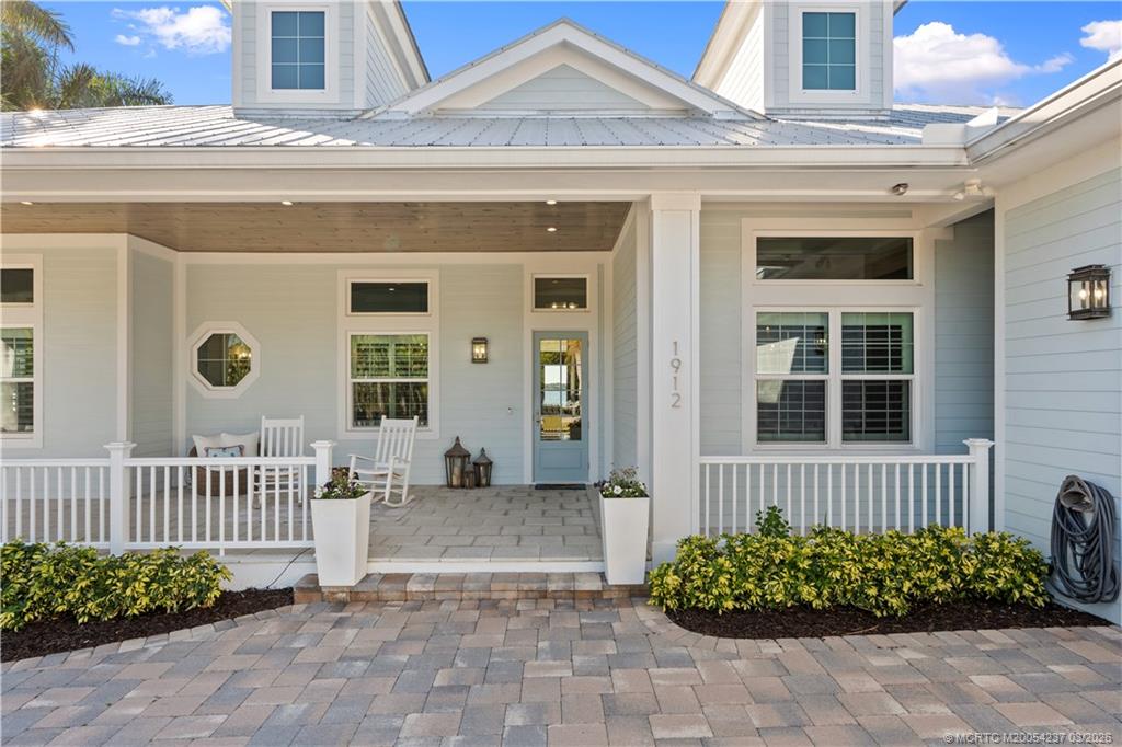 1912 Northwest Cove Circle Stuart, FL 34994 - Photo 4 of 24 a front view of a house