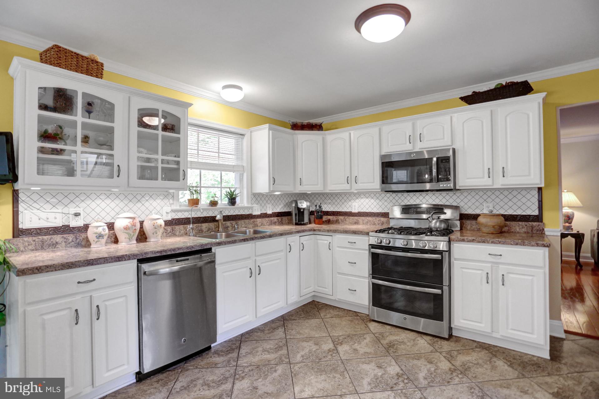 545 Laurel Ridge Road Reinholds, PA 17569 - Photo 8 of 65 Kitchen with tile flooring and granite counterops