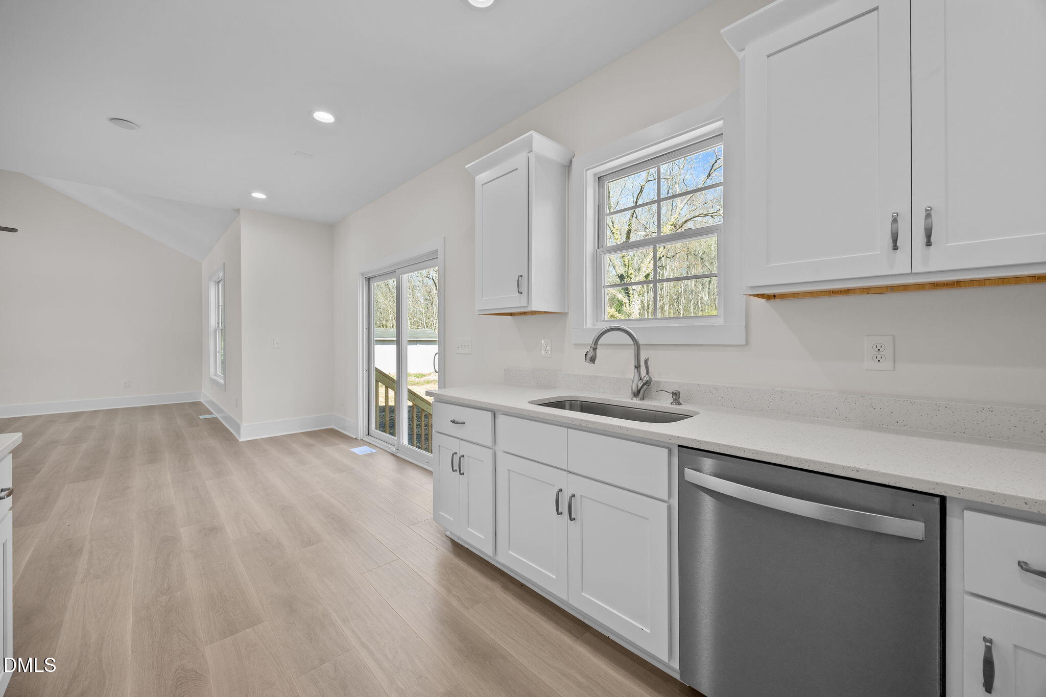 506 Hicks Mill Road Oxford, NC 27565 - Photo 5 of 15 a kitchen with sink cabinets and window