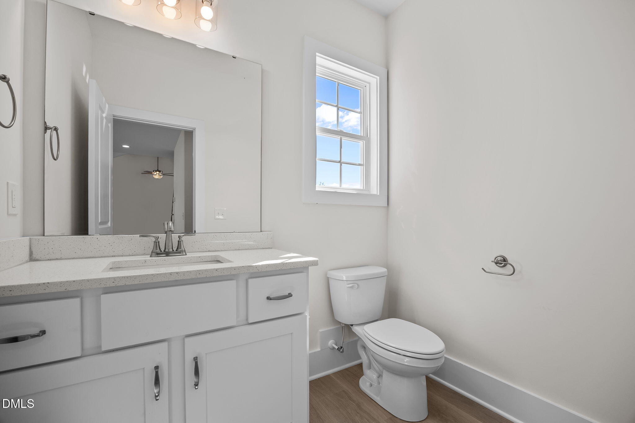506 Hicks Mill Road Oxford, NC 27565 - Photo 6 of 15 a bathroom with a toilet sink and mirror