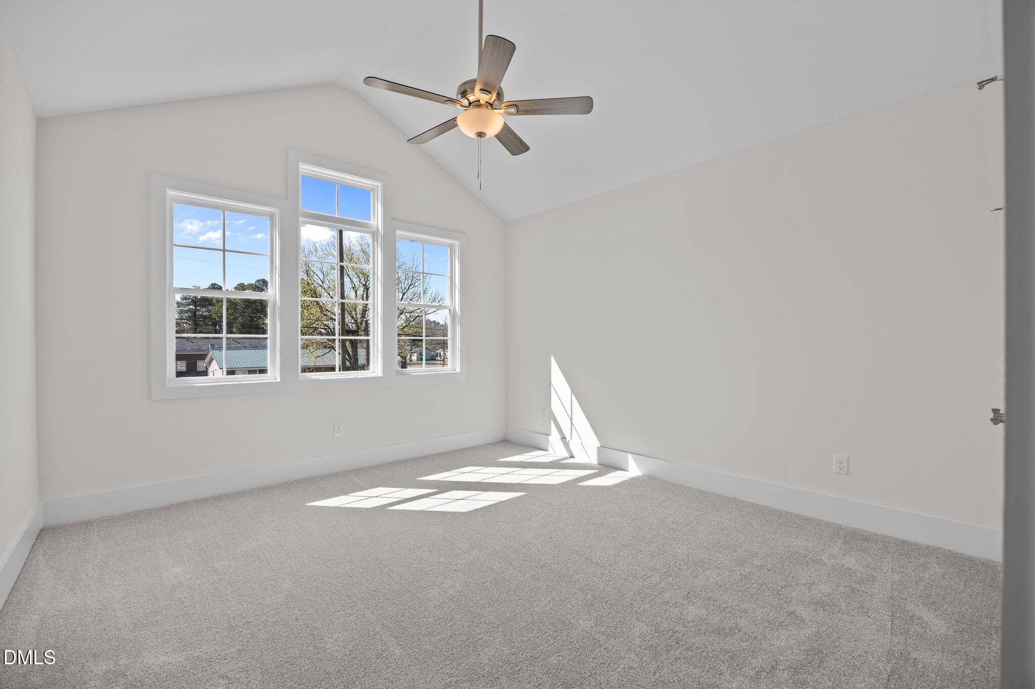 506 Hicks Mill Road Oxford, NC 27565 - Photo 7 of 15 a view of wooden floor and a chandelier fan in a room