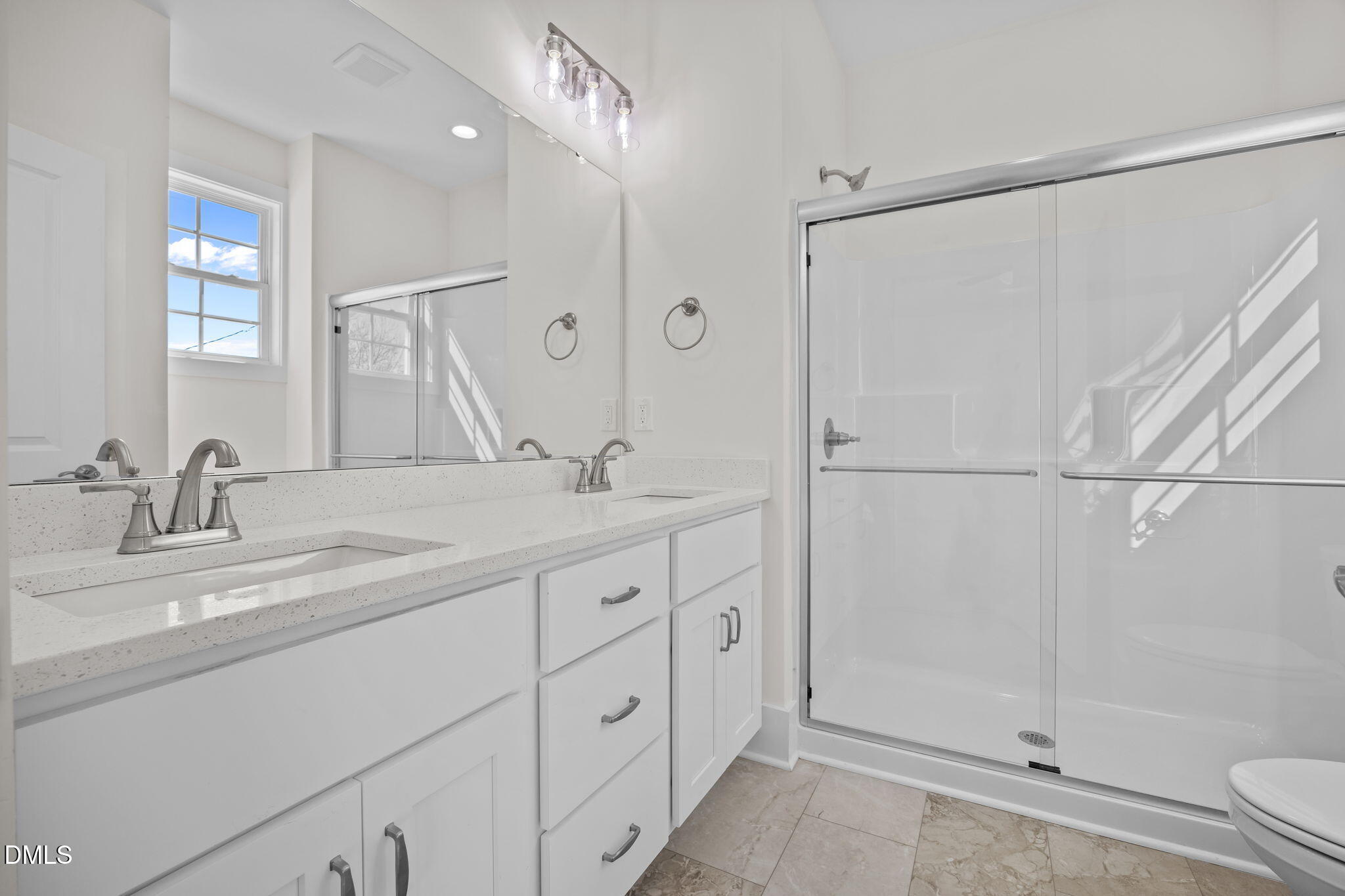 506 Hicks Mill Road Oxford, NC 27565 - Photo 9 of 15 a bathroom with a double vanity sink mirror and shower