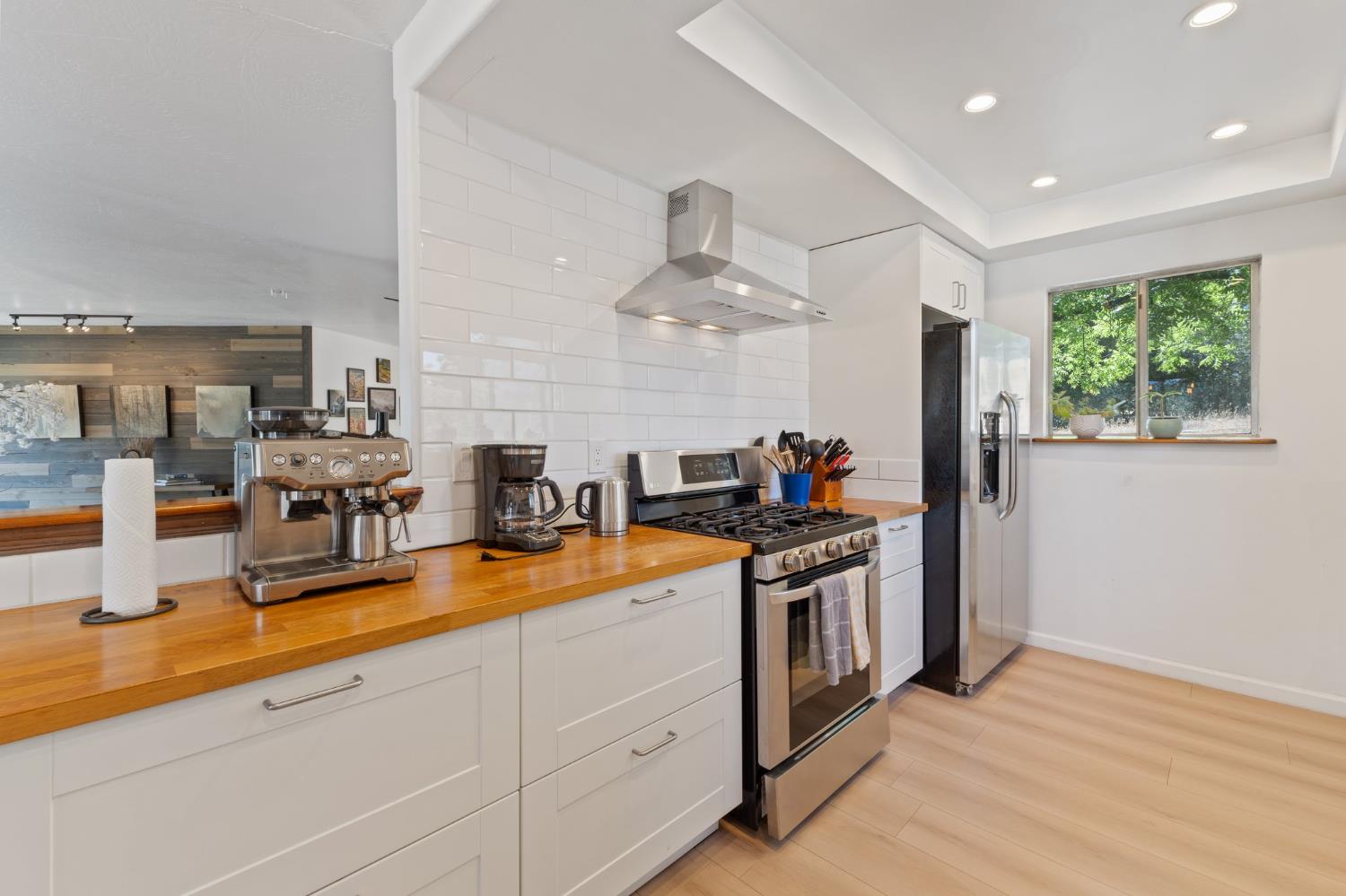 4577 Totokon Road Mariposa, CA 95338 - Photo 12 of 57 a kitchen with stainless steel appliances granite countertop a stove and a sink
