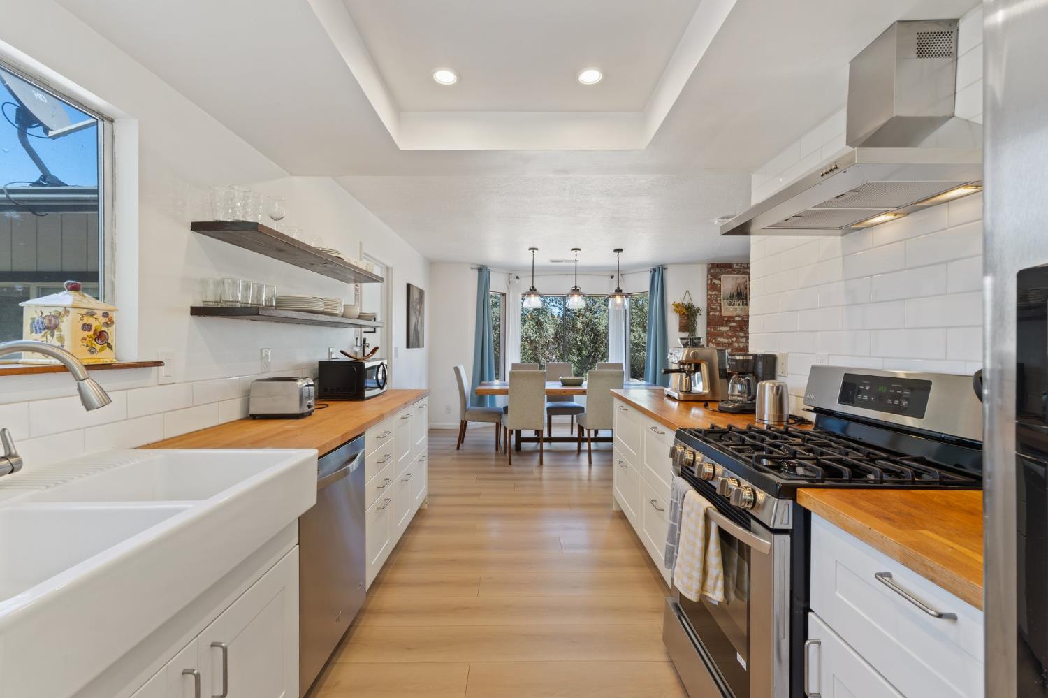 4577 Totokon Road Mariposa, CA 95338 - Photo 14 of 57 a kitchen with stainless steel appliances a sink and a stove