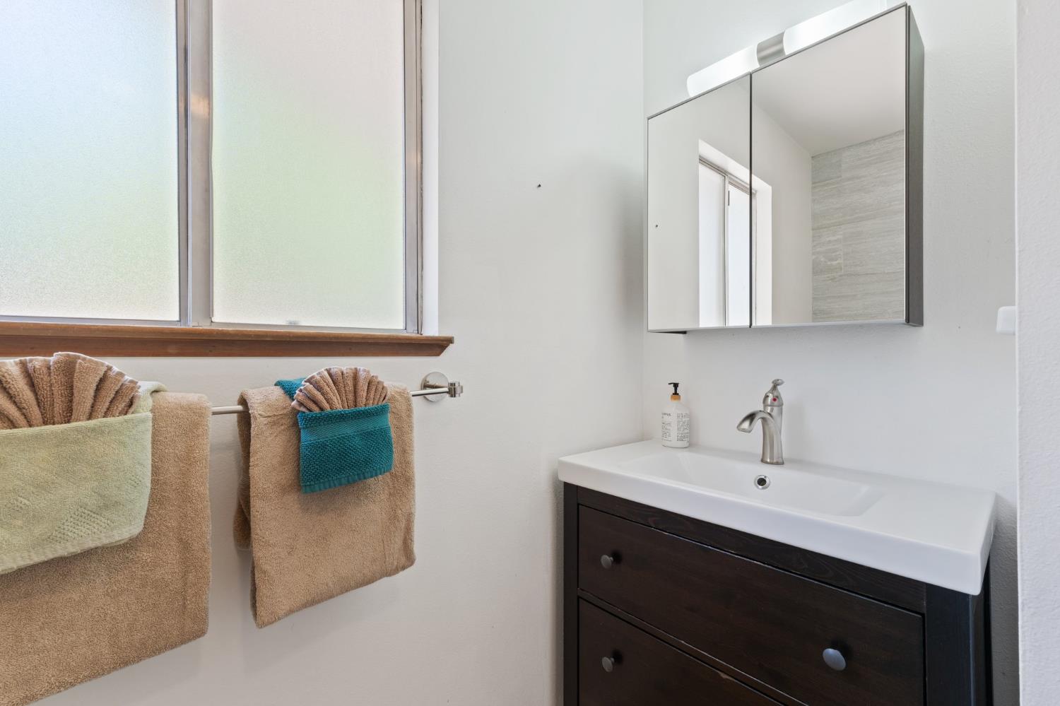 4577 Totokon Road Mariposa, CA 95338 - Photo 27 of 57 a bathroom with a sink and a mirror
