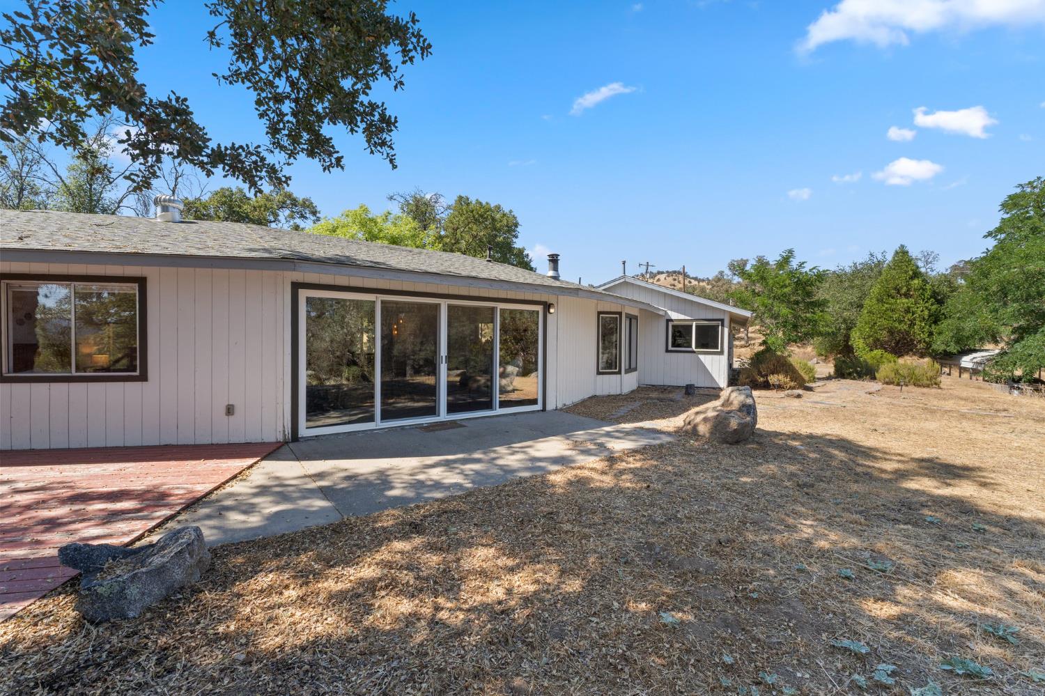 4577 Totokon Road Mariposa, CA 95338 - Photo 45 of 57 a view of a house with a backyard