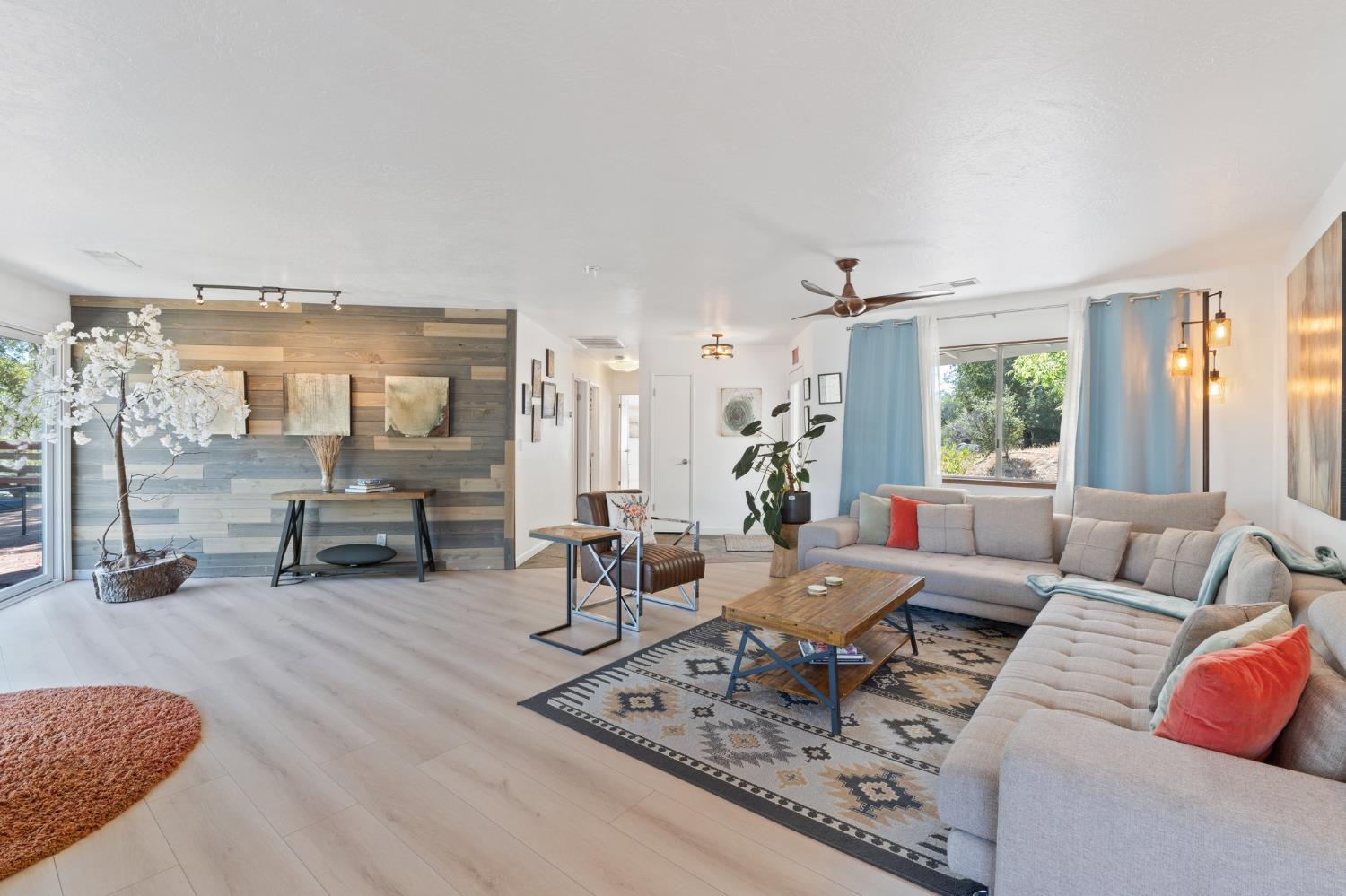 4577 Totokon Road Mariposa, CA 95338 - Photo 8 of 57 a living room with furniture and large windows