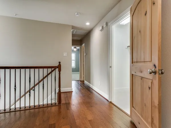a kitchen with granite countertop a sink stove and cabinets