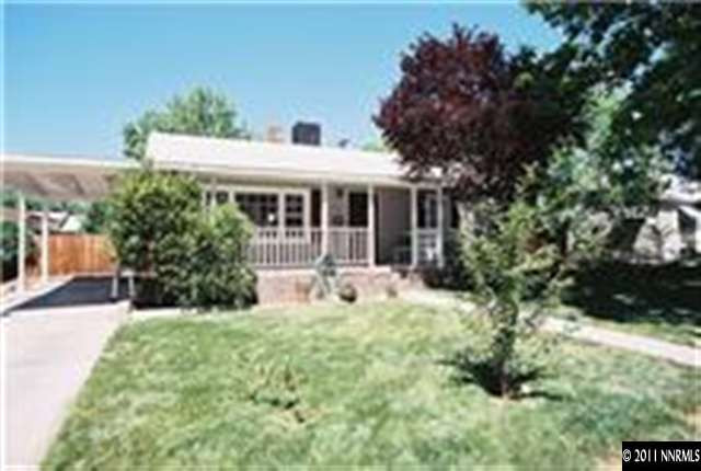 939 Lester Avenue Reno, NV 89502 - Photo 1 of 9 a view of a house with backyard porch and sitting area