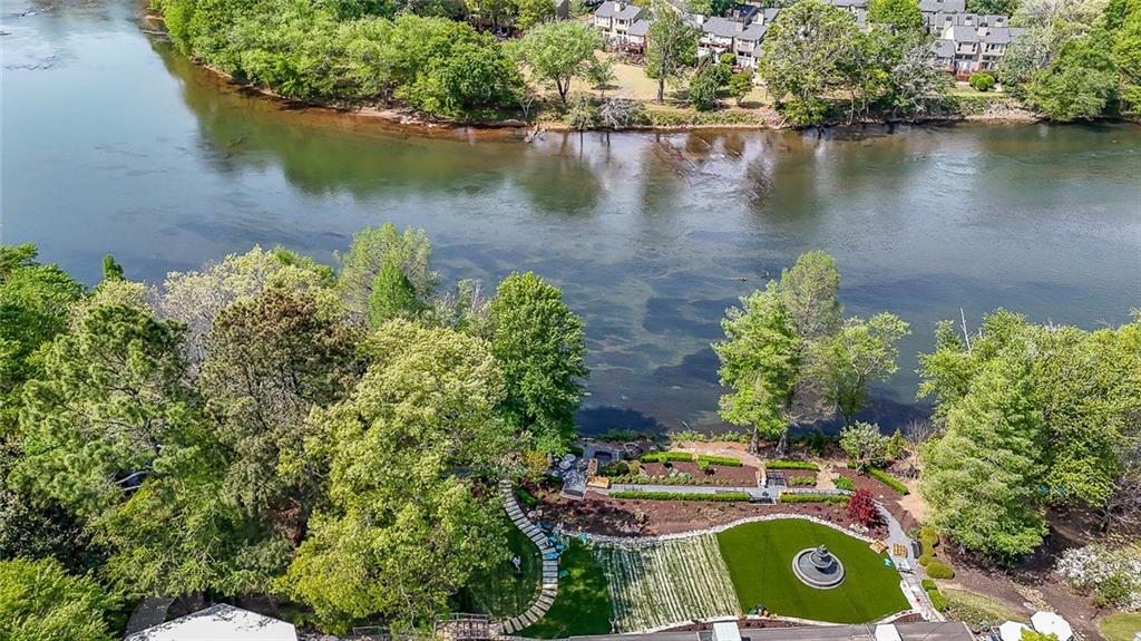 302 Riversgate Drive, Unit 55 Atlanta, GA 30339 - Photo 30 of 40 an aerial view of house with yard lake and lake view