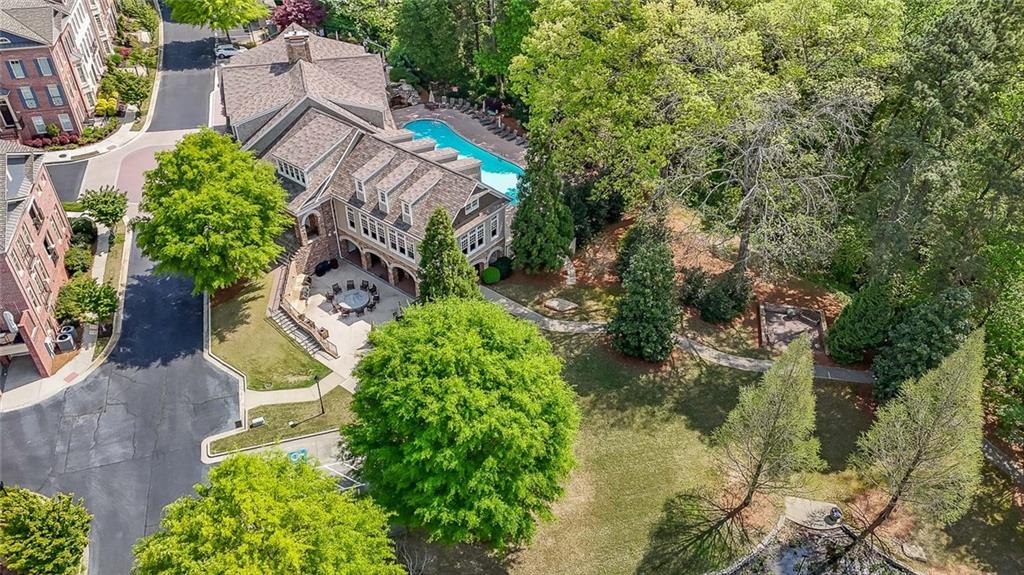 302 Riversgate Drive, Unit 55 Atlanta, GA 30339 - Photo 35 of 40 an aerial view of a house with a yard and lake view