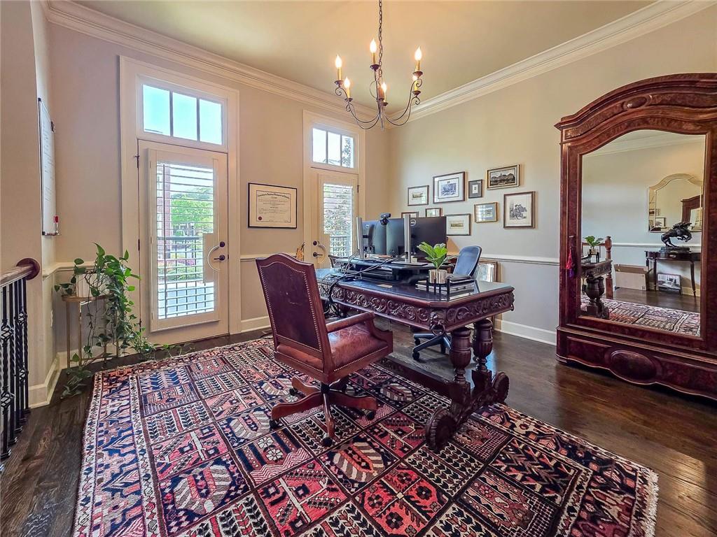 302 Riversgate Drive, Unit 55 Atlanta, GA 30339 - Photo 5 of 40 a living room with a piano and a table