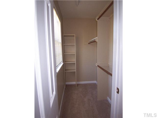 2417 Sawmill Road Raleigh, NC 27613 - Photo 10 of 16 Spacious walk-in closet of master bedroom.