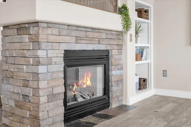 a living room with a fireplace