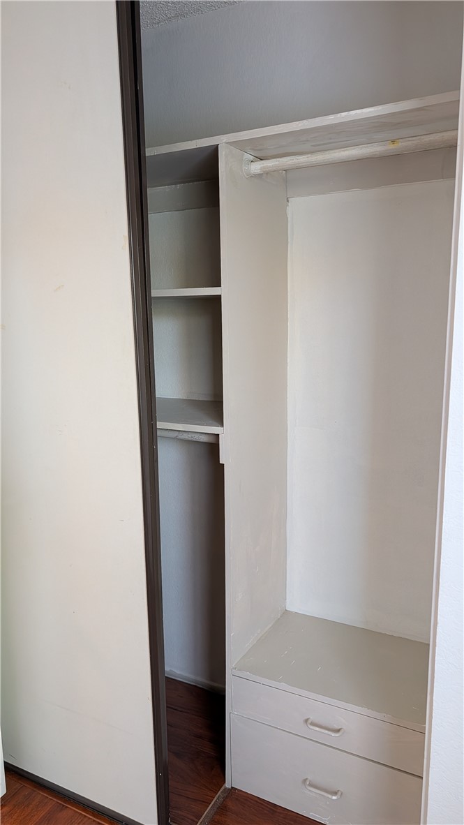 19143 East Aurora Drive Walnut, CA 91789 - Photo 14 of 27 a view of walk in closet with empty racks