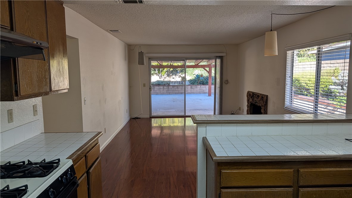 19143 East Aurora Drive Walnut, CA 91789 - Photo 10 of 27 a kitchen with a sink a window and cabinets