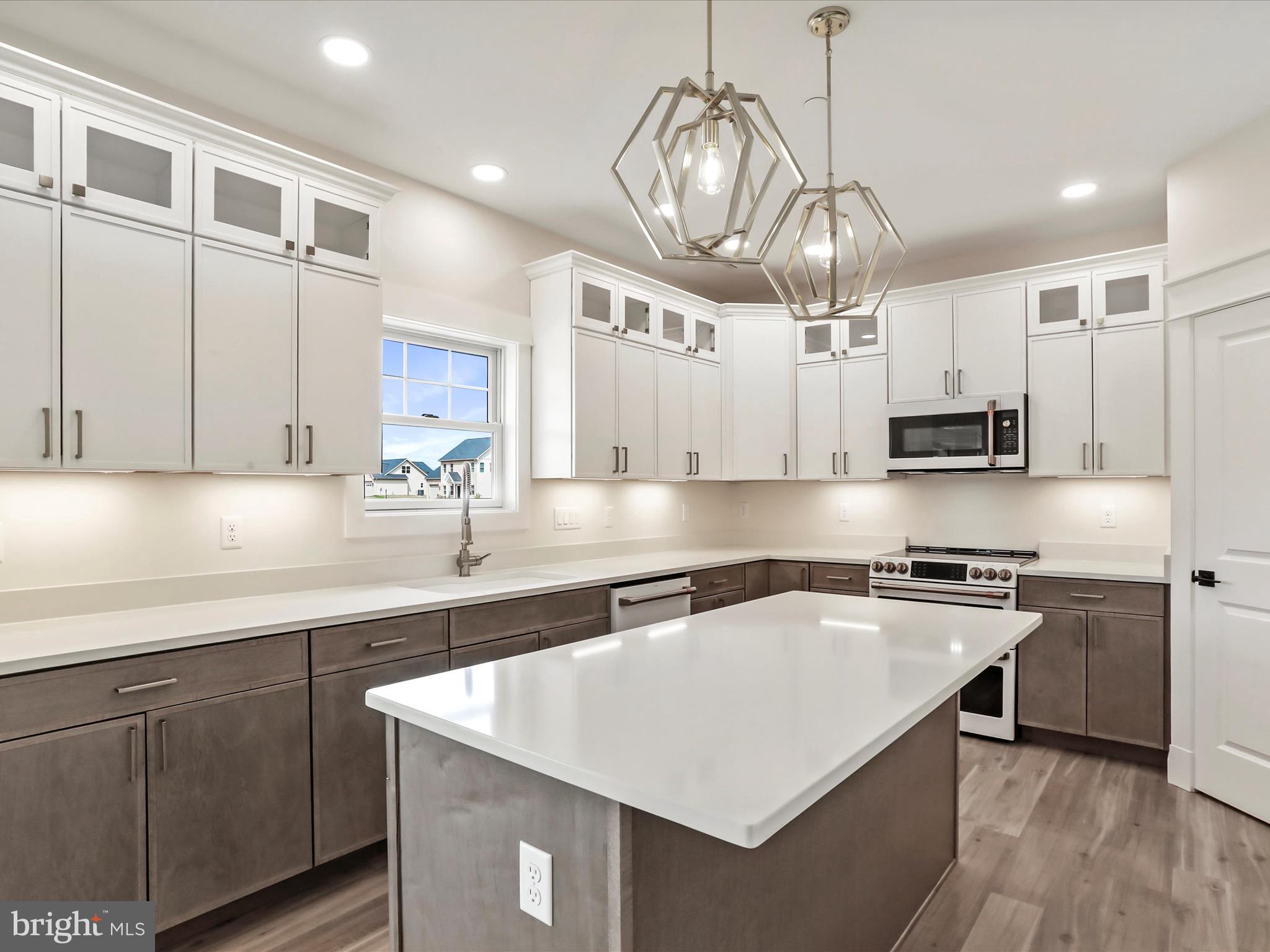 0 Paradise Church Road Hagerstown, MD 21742 - Photo 17 of 59 a kitchen with stainless steel appliances granite countertop a sink a stove and a refrigerator