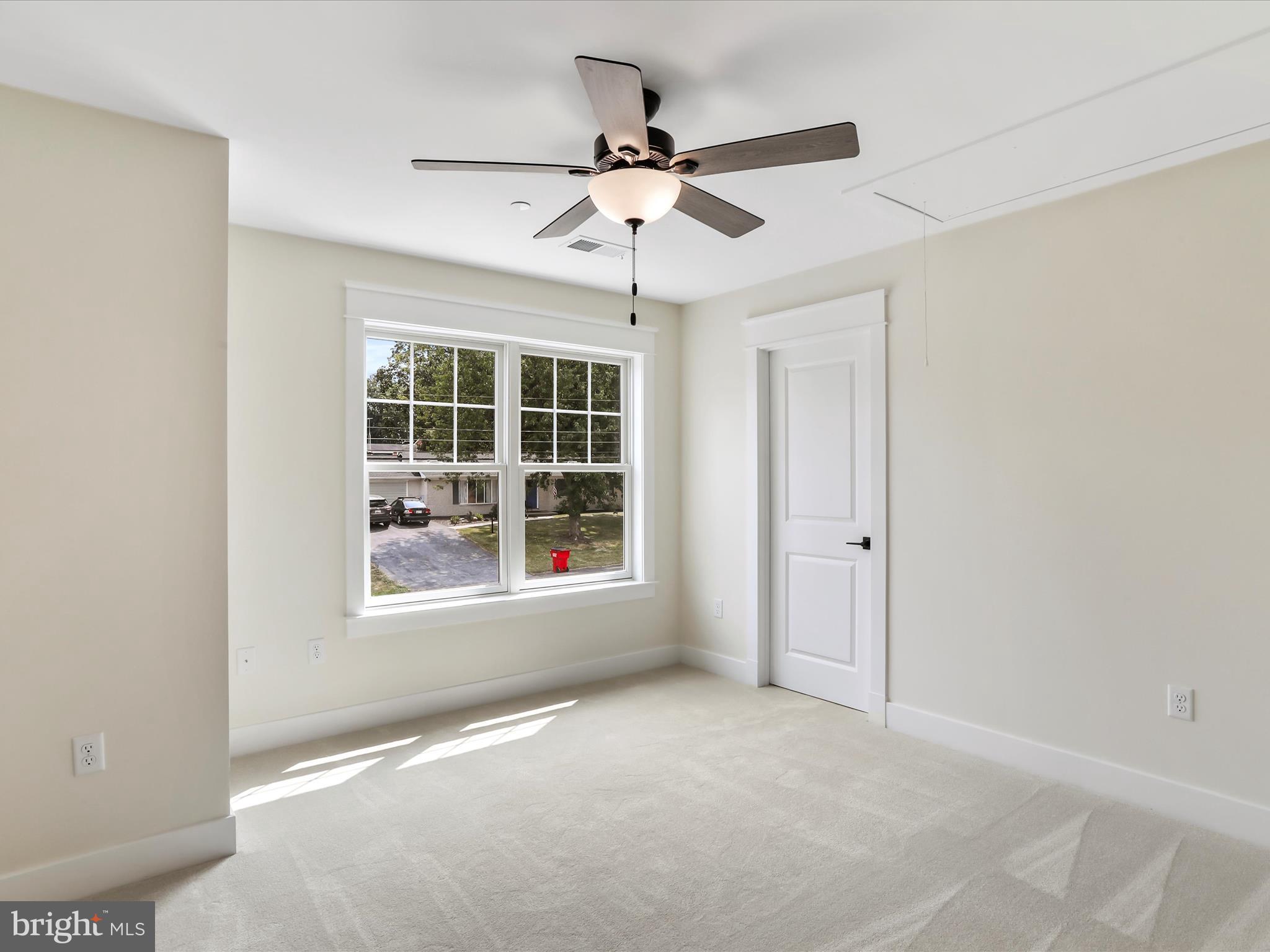 0 Paradise Church Road Hagerstown, MD 21742 - Photo 33 of 59 an empty room with windows and fan