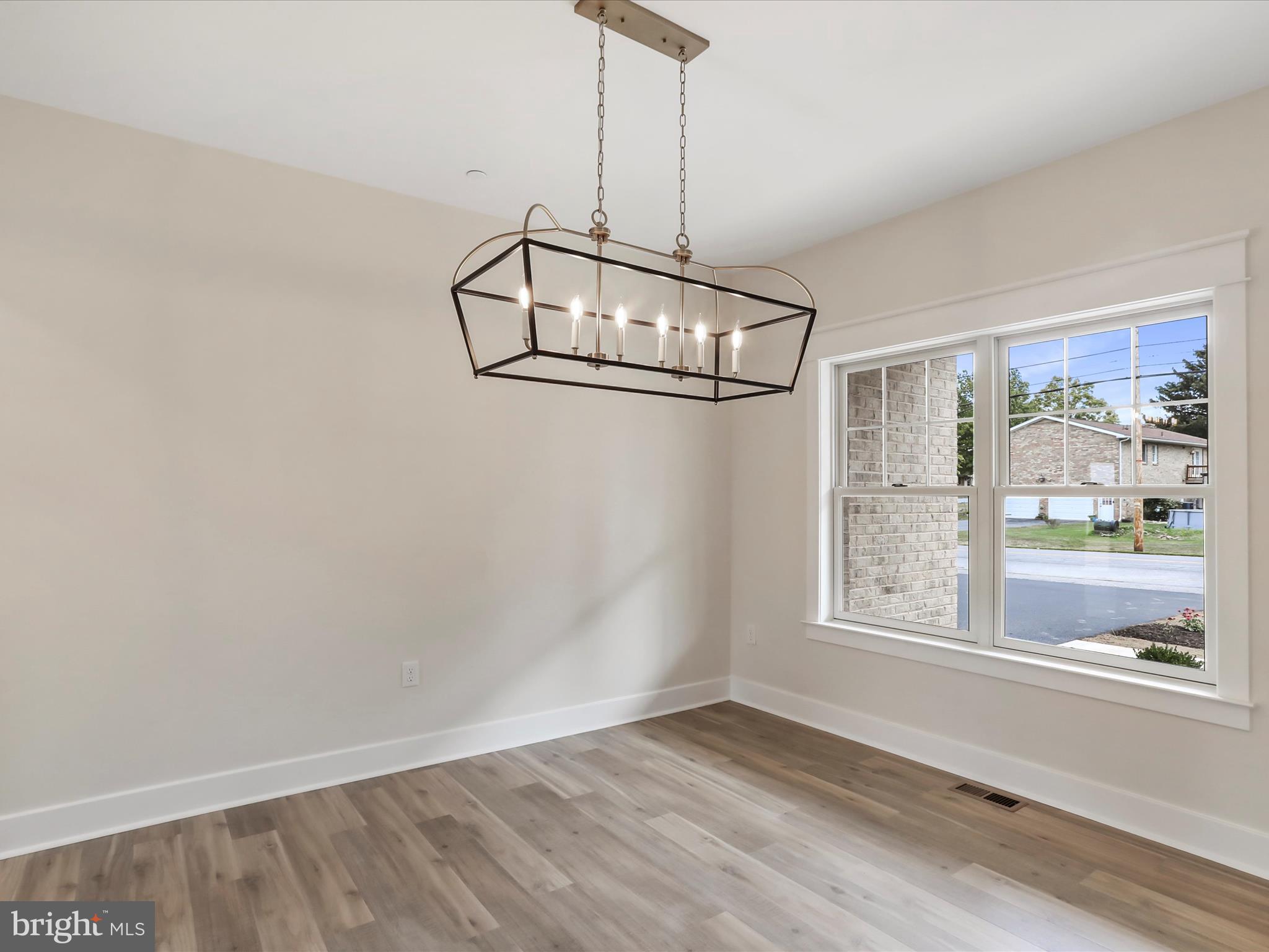 0 Paradise Church Road Hagerstown, MD 21742 - Photo 8 of 59 a view of a room with wooden floor and windows