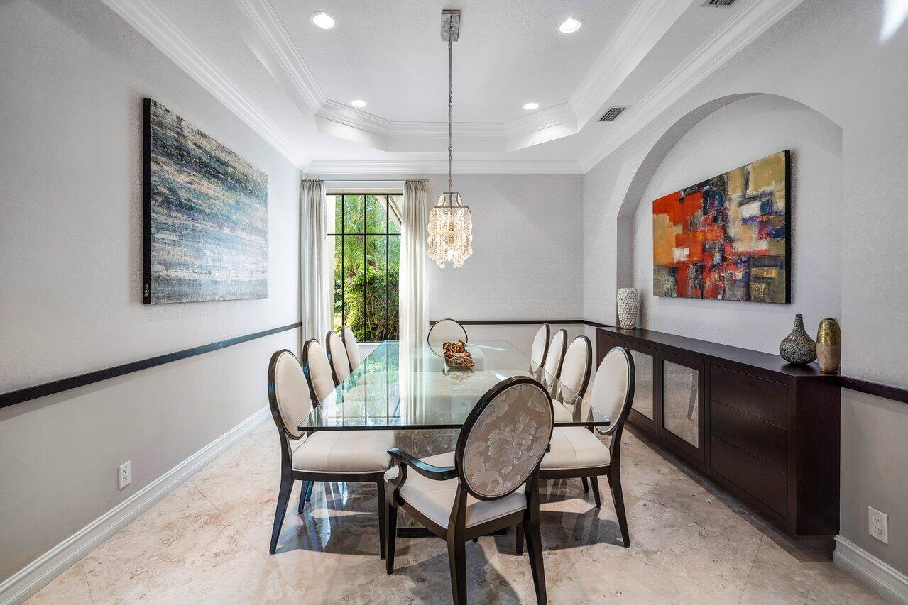 17657 Middlebrook Way Boca Raton, FL 33496 - Photo 11 of 98 a dining room with furniture a chandelier and window