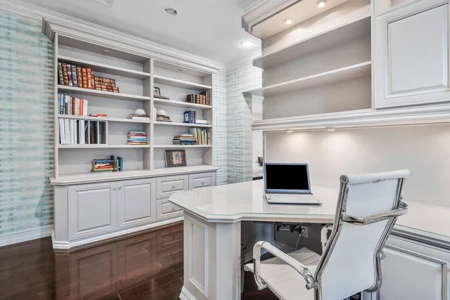 an aerial view of a house with outdoor space and lake view