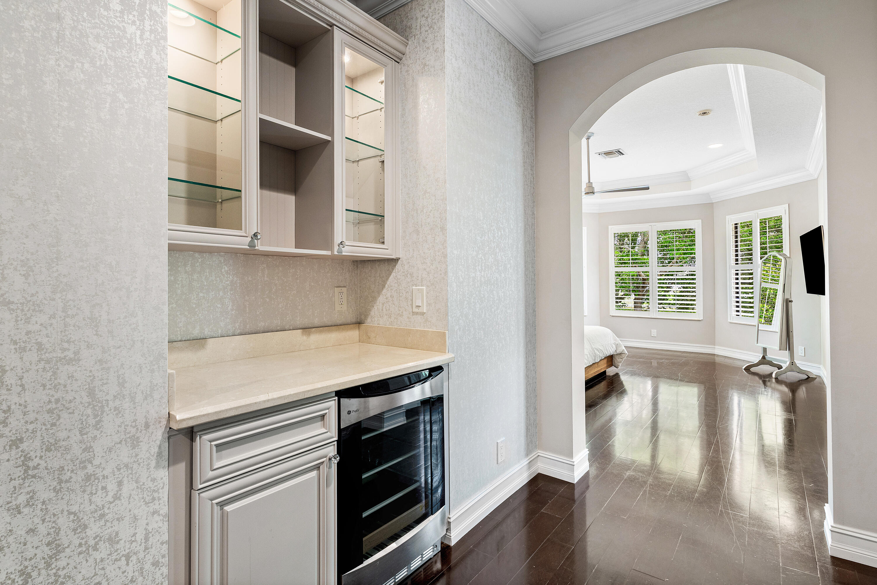 17657 Middlebrook Way Boca Raton, FL 33496 - Photo 32 of 98 a kitchen with a stove and a white cabinet with wooden floor