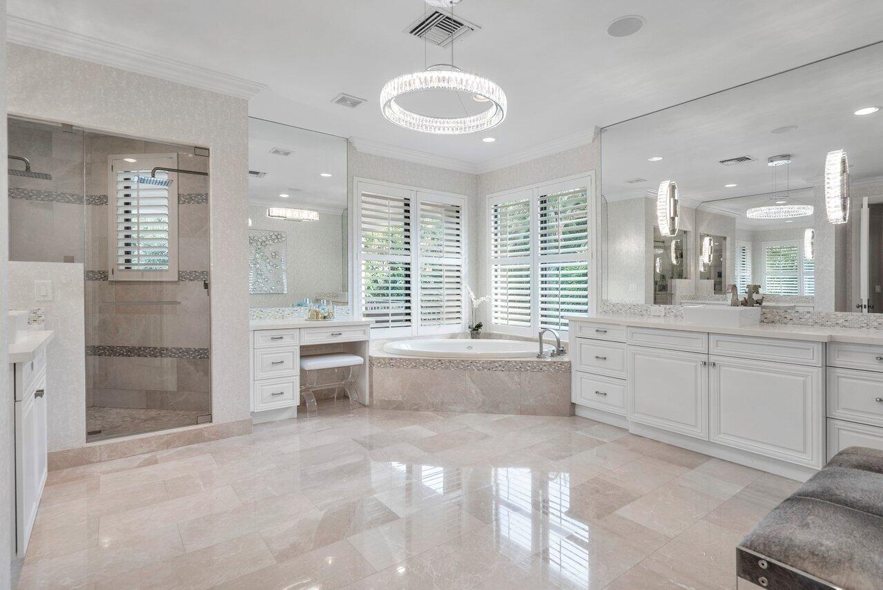 17657 Middlebrook Way Boca Raton, FL 33496 - Photo 35 of 98 a large bathroom with a large tub sink shower and mirror